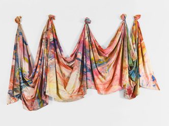 Sam Gilliam, Carousel Change, 1970, Acrylic paint on canvas and leather string, 3000 x 23370 mm, Tate, Promised gift of Pamela J. Joyner and J. Giuffrida (Tate Americas Foundation), Image Courtesy David Kordansky Gallery, Tate Archive