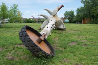 Nari Ward, Scapegoat, 2017, Steel, wood, concrete, tire tread, fire hose, 40 x 12 x 12 feet, Photo: Matthew Herrmann, Courtesy the artist, Socrates Sculpture Park, Lehmann Maupin-New York / Hong Kong and Galleria Continua-San Gimignano / Beijing / Les Moulins / Habana