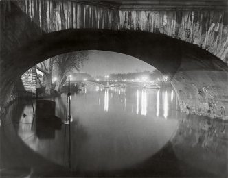 Brassaï, View through the pont Royal toward the pont Solférino, c. 1933, 40.1 x 51 cm, [Nuit 53], Estate Brassaï Succession-Paris, © Estate Brassaï Succession-Paris