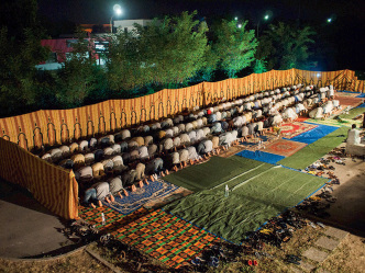 Nicolo Degiorgis, Foam Talent 2016, Untitled, 2014, from the series: Hidden Islam, A parkinglot in front of a warehouse used as Islamic makeshift place of worship, Province of Treviso