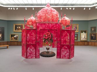 Rina Banerjee, Take me, take me, take me…to the Palace of love, 2003, plastic, antique Anglo-Indian Bombay dark wood chair, steel and copper framework, floral picks, foam balls, cowrie shells, quilting pins, red-colored moss, antique stone globe, glass, synthetic fabric, shells, fake birds, 226 x 161 x 161 in, Courtesy of artist and Galerie Nathalie Obadia, Paris/Brussels, © Rina Banerjee, Image courtesy of Pennsylvania Academy of the Fine Arts-Philadelphia/Barbara Katus. Installation View: Rina Banerjee: Make Me a Summary of the World, Pennsylvania Academy of the Fine Arts