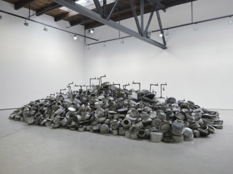 Subodh Gupta, This is not a fountain, 2011–13. Old aluminum utensils, water, painted brass taps, PVC pipes, and motor, 65 x 190 x 309 inches (165.1 x 482.6 x 784.9 cm). Collection Albright-Knox Art Gallery-Buffalo, New York; George B. and Jenny R. Mathews Fund, by exchange and Charles Clifton Fund, by exchange, 2015 (2015:6). © 2011–2013 Subodh Gupta, Image courtesy the artist and Hauser & Wirth. Photo: Genevieve Hanson