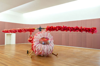 Joana Vasconcelos, Lilicoptère, 2012, Bell 47 helicopter, ostrich feathers, Swarovski crystals, gold leaf, industrial paint, fine gold-tinted leather upholstery, Arraiolos carpets, walnut wood, decorative imitation wood painting and trimmings, 300 x 1265 x 274 cm, Private Collection, Work produced in collaboration with, Fundação Ricardo do Espírito Santo Silvz-Lisbon