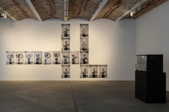 Back: Anna Daučíková, Upbringing by Exercise, 1996/2016, 17 b/w-photographs; front right: Anna Daučíková, We Care For Four Eyes II, 2002, HD video; installation view of the exhibition, KW Institute for Contemporary Art, Berlin, 2019, Courtesy the artist, Photo: Frank Sperling