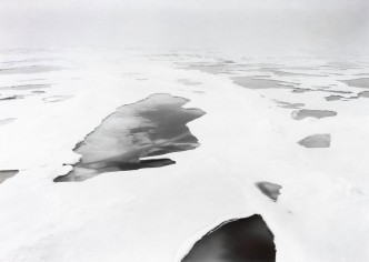 Thomas Joshua Cooper, rising freezing fog, The Arctic Ocean. Sea ice, sestrugi and melt lakes, The North Pole, 90° N., 2007-2008