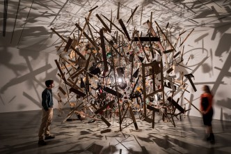 Cornelia Parker, Cold Dark Matter: An Exploded View, 1991. Installation view, Museum of Contemporary Art Australia, 2019. Blown up garden shed and contents, wire, light bulb. Tate: Presented by the Patrons of New Art (Special Purchase Fund) through the Tate Gallery Foundation 1995. Image courtesy the artist, Museum of Contemporary Art Australia and Frith Street Gallery, London. Photograph: Anna Kučera