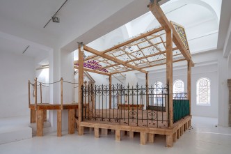 Emily Jones, purity is not an option, 2019. Installation, wood, wrought iron, corrugated polycarbonate, tin tiles, tissue paper, glass pitchers, leaves, rope, cat food. Exhibition view “as a bird would a snake”, centre d’art contemporain - la synagogue de Delme, 2019. Courtesy of the artist. Photo credit: O.H. Dancy