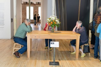 Laurie Anderson, Handphone Table, 1978, In “Handphone Table” visitors are invited to perceive sounds through the bones in their elbows, © Laurie Anderson, Courtesy the artist and MASS MOCA