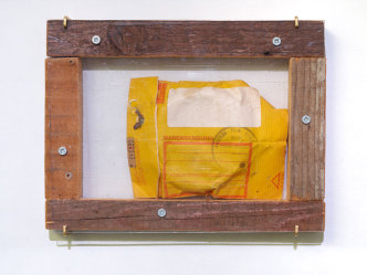 Christoph Schlingensief, Message in a Bottle, 2008, object; wooden frame, Plexiglas, Super 8mm film inverse positive in envelope, addressed, franked and stamped. Photo: Simon Vogel. Courtesy of the Estate of Christoph Schlingensief