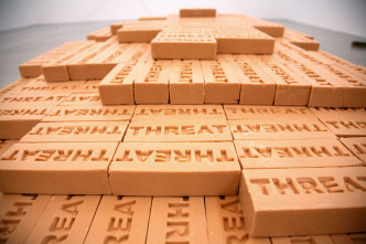 Shilpa Gupta, Threat, 2008-2009, Bathing soaps, 15 × 6.2 × 4 cm each soap, 72 x 229 x 107 cm stack of 4.500 soaps, Courtesy: the artist. Photographer: Didier Bamoso