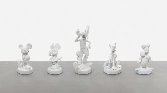 Damien Hirst, Five Friends, 2018 Carrara marble, in 5 parts, Mickey: 30 ⅝ × 17 ½ × 17 ¼ inches (77.8 × 44.3 × 43.9 cm), Minnie: 31 ½ × 16 ⅝ × 17 ¼ inches (79.8 × 42.1 × 43.8 cm), Donald: 29 ¾ × 20 ⅜ × 17 ¾ inches (75.6 × 51.8 × 45.1 cm), Pluto: 30 ½ × 21 ½ × 23 inches (77.4 × 54.5 × 58.2 cm), Goofy: 49 ⅜ × 16 ¼ × 24 ½ inches (125.2 × 41.1 × 62.1 cm), edition of 3 + 2 AP, © Damien Hirst and Science Ltd. All rights reserved, DACS 2021. Photo: Lucio Ghilardi/Prudence Cuming Associates