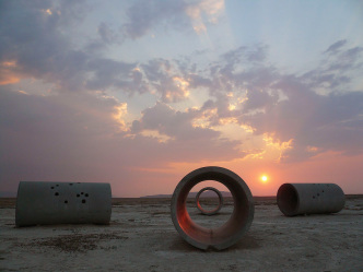 Nancy Holt, Sun Tunnels, 1973-76, Concrete, steel, earth, 280 × 2620 × 1620 cm / 110 1/4 × 1031 1/2 × 637 7/8 inches, © Holt/Smithson Foundation, Licensed by VAGA at ARS, New York Courtesy Sprüth Magers Gallery