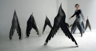 Rosemarie Castoro, Mountain Range, 2003. Welded stainless steel, 9 parts. 350 x 650 cm, © Rosemarie Castoro, Courtesy Rosemarie Castoro Estate and Thaddaeus Ropac Gallery