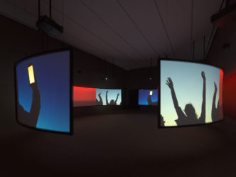 Doug Aitken, Wilderness, 2022, Video installation with eight-channel composited video (color, sound), six projections, four semicircular aluminum and PVC screens, 14:14 minutes/loop, Installation dimensions variable; minimum room size: 15 x 60 x 34 ft (457.2 x 1828.8 x 1036.3 cm), Edition of 4, with 2AP, © Doug Aitken, Courtesy the artist and 303 Gallery