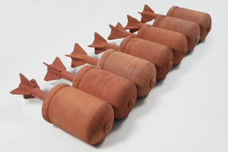 Dagoberto Rodríguez, Ánforas III (7 bombs), 2020, Fired clay, allover dimension 28 x 196 x 84 cm, each 28 x 84 x 28 cm, © Dagoberto Rodríguez, Courtesy the artist and Galerie Peter Kilchmann