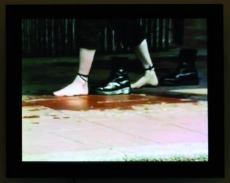 Mona Hatoum, Roadworks, 1985. Documentation of performance, Brixton, London. Color video with sound; 6 minutes, 45 seconds. © Mona Hatoum. Photo: Stefan Rohner, courtesy Kunstmuseum St. Gallen