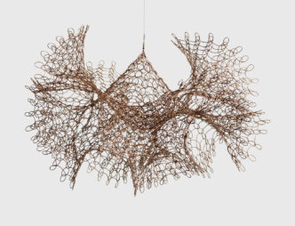 Ruth Asawa, Untitled (S.350, Two Interlocking Forms with Fluted Edges), 1960s, Hanging sculpture—copper wire, 8 x 12 x 12 inches (20.3 x 30.5 x 30.5 cm), Courtesy David Zwirner Gallery