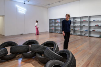 Installation view Delphine Reist. OL [oil, olio, huile] at Museum Tinguely, Basel, 2023. Delphine Reist, Ressort V [spring VJ, 2023 (top, front) Delphine Reist, Waders, 2022 (bottom), Delphine Reist, Banniere [banner], 2023 (top, back), Courtesy Delphine Reist, Galerie Lange+ Pult, Galerie Laurent Godin, © Delphine Reist, Photo: 2023 Museum Tinguely, Basel; Bettina Matthiessen