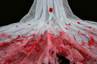 Evi Kyrmakidou, Blood Crowns, 2017, Dimensions: Variable. Height of female form: 170cm Length on floor with veil fully extended: approx. 300 cm, Width on floor with veil fully extended: approx. 200cm, Media: installation Materials: Gypsum plaster, metals, lace, flowers, candelabrum, polyurethane, putty, glues. Curated by Emmanuel Mavrommatis