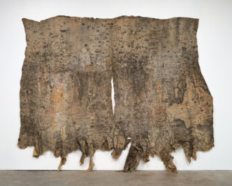 Eddie Rodolfo Aparicio, El ruido del bosque sin hojas / The Sound of the Forest without Leaves (obverse), 2020, cast rubber with ficus tree surface residues; glass; acrylic and wood glue on found cloth; twine; and wooden support, approx. 122 × 90 × 6 in. (309.9 × 228.6 × 15.2 cm). Hammer Museum, Los Angeles. Purchased through the Board of Advisors Acquisition Fund. Image courtesy of the artist and Commonwealth and Council, Los Angeles and Mexico City, © Eddie Rodolfo Aparicio. Photo by Ruben Diaz